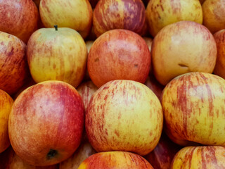 pile of red apples in the market