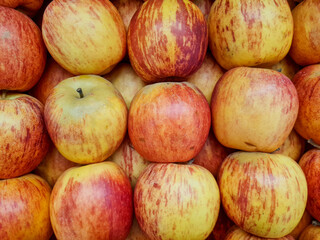 pile of red apples in the market