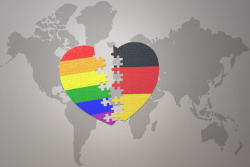 puzzle heart with the rainbow gay flag and germany on a world map background. Concept.