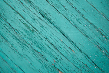 old aqua blue painted diagonal wooden planks . Rustic turquoise blue wooden planks diagonally. Copy...