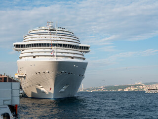 Fototapeta na wymiar Cruise ship docked in port, front view