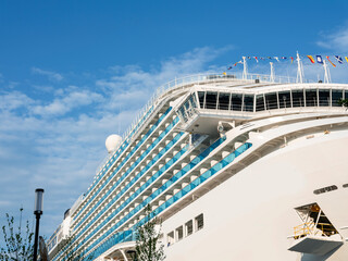 Cruise ship docked in port, front view