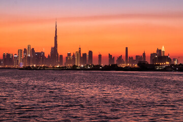 Dubai Creek Harbor sunset with the image of Dubai Downtown, October 2021