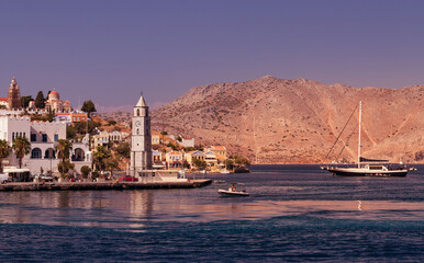 The clock tower on Symi Island seen from the ship