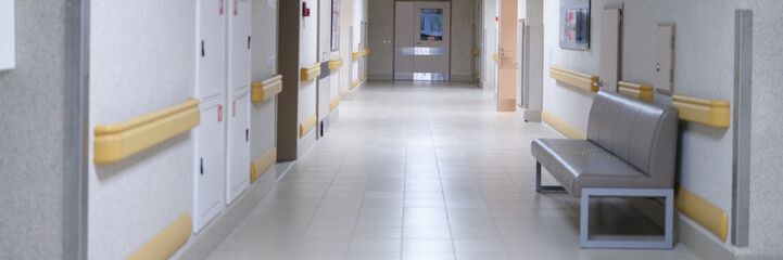 Fototapeta na wymiar Empty building corridor, bright hall of the clinic
