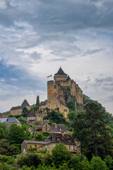 Fototapeta na wymiar vertical view of the castle in Castelnaud-la-Chapelle in the Dordogne Valley under an overcast sky