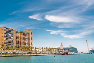 Panoramic view of the port of Malaga. In background Wonder of the Seas docked, the largest cruise ship in the world, owned and operated by Royal Caribbean International.