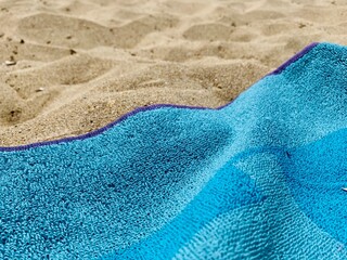 blue towel on the sand texture