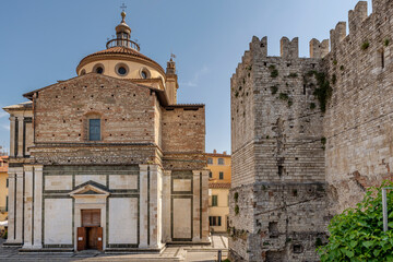 Basilica of Santa Maria delle Carceri and the walls of the emperor's castle, Prato, Italy
 - obrazy, fototapety, plakaty