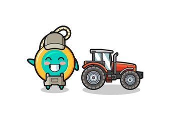 the yoyo farmer mascot standing beside a tractor