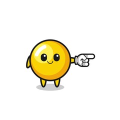 egg yolk mascot with pointing right gesture