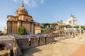 Scenic view on ruins of Roman Forum with Church of Saints Luke and Martina. Rome cityscape on a...