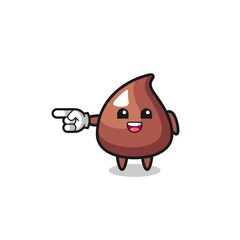 choco chip cartoon with pointing left gesture