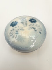 Vintage porcelain box with blue folk art pattern