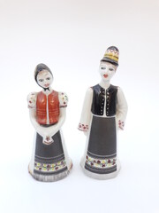 Vintage porcelain figurines - a couple wearing folk art costume
