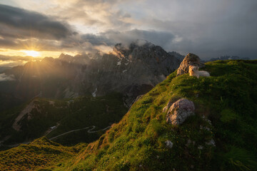 Fototapeta na wymiar Sunrise in the mountains on a moody morning