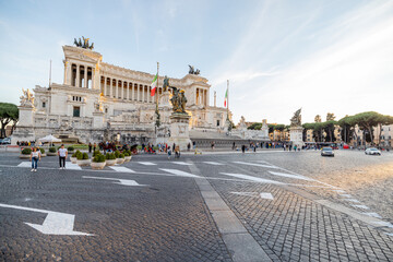 View on Monument of Vittorio Emanuele from square Venezia in Rome. Sunset cityscape with Roman landmarks. Concept of historical landmarks and travel Italy