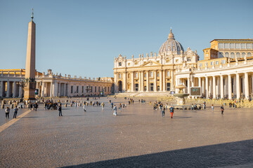 Saint Peter's Square with Vaticano Obelisk and church in Rome on sunny day. Concept of religious...