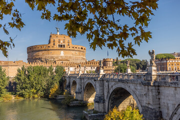 Landscape of Tiber river and Castle of the Holy Angel in Rome on sunny autumn day. Traveling Italy...