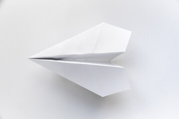 Paper plane origami isolated on a white background