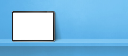 Digital tablet pc on blue wall shelf. Background banner