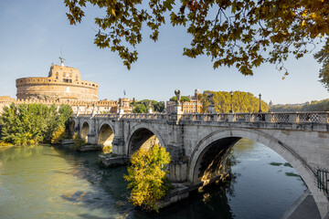 Landscape of Tiber river and Castle of the Holy Angel in Rome on sunny autumn day. Traveling Italy...