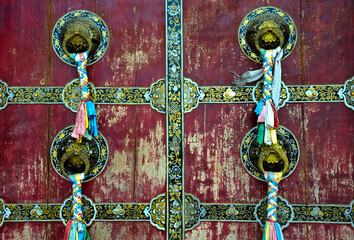 The red doors of Tibetan Buddhist temples in Tibet, China.