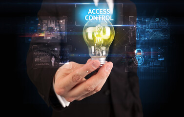 Businessman holding a light bulb, online security concept