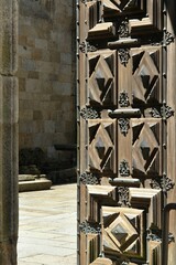 Massive wooden door of the Braga Se church, Norte - Portugal 