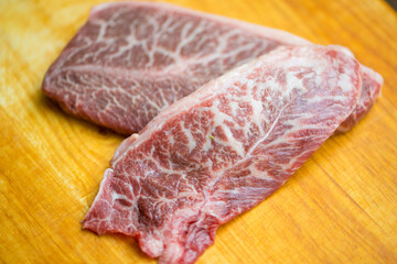 Closed up Marble meat on wood floor