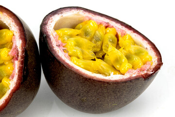 Superior Quality Fresh Passion Fruit, cut, isolated in white background, macro details, studio lighting, seeds, no-one 