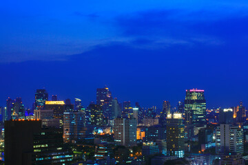 Obraz premium Bangkok Skyline include modern building in downtown at night time, is the capital and most populous city of Thailand