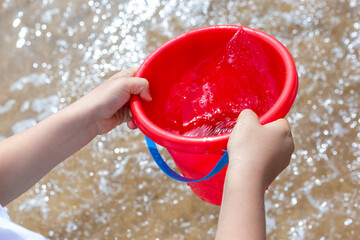 child playing with water