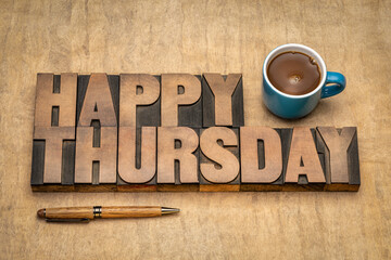 Happy Thursday word abstract in vintage letterpress wood type against textured handmade paper with a cup of coffee, cheerful greetings © MarekPhotoDesign.com