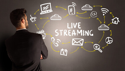 businessman drawing social media icons