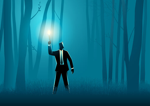 Businessman walking with torch in the dark woods