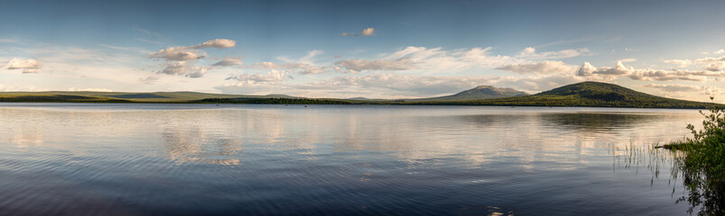 Fototapeta na wymiar Southern Urals, Ural Mountains, Zyuratkul National Park. Panorama of Zyuratkul Lake.