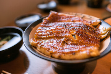 接写したウナギの蒲焼　鰻丼　うな重　Rice bowl topped with Unagi (grilled freshwater eel) in Japan