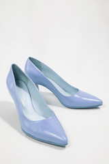 Medium high heel , light blue color, women shoes isolated on white background