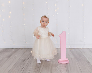 The little girl is one year old.

