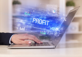 Closeup of businessman hands working on laptop