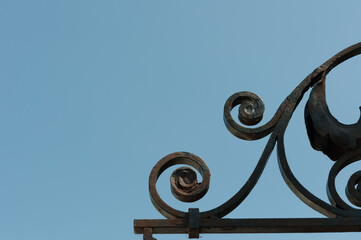 Fototapeta premium wrought iron fence and sky