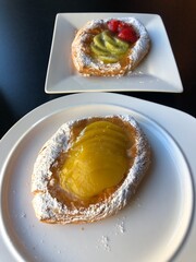 Pastries with peach, strawberry and kiwi