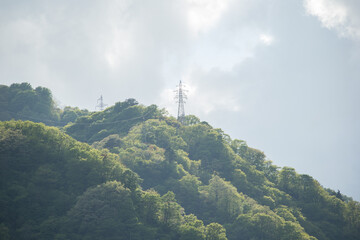 Obraz premium 送電線と山②