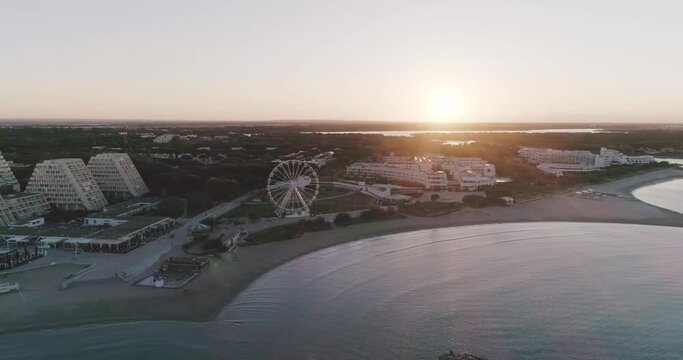 Aerial view of La Grande-Motte, South of France Ferris Wheel in the morning