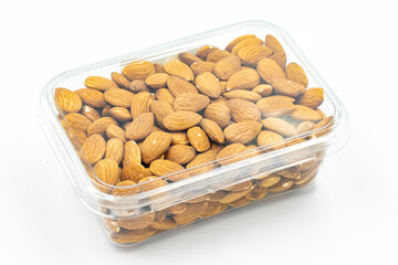 Almond nuts in package isolated on white background. Organic nuts. close up