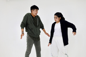 Happiness Asia child's learning to dance in classroom for summer weekend.