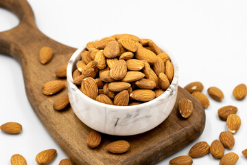 Almond nuts isolated on a white background. Organic nuts. close up