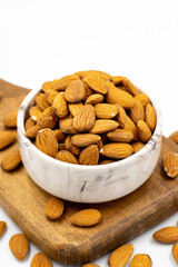 Almond nuts isolated on a white background. Organic nuts. close up