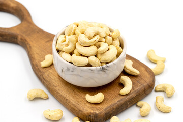 Cashew nuts isolated on white background. Organic nuts. close up